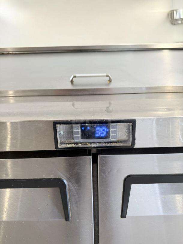 Turbo Air MSR-49NM prep table refrigerator in excellent condition, digital display showing temperature, stainless steel finish.