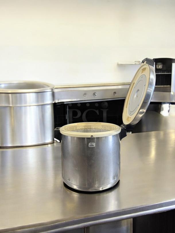 Zojirushi commercial rice cooker/warmer, 55-cup capacity, excellent condition. Stainless steel, 120V, fully tested and working.