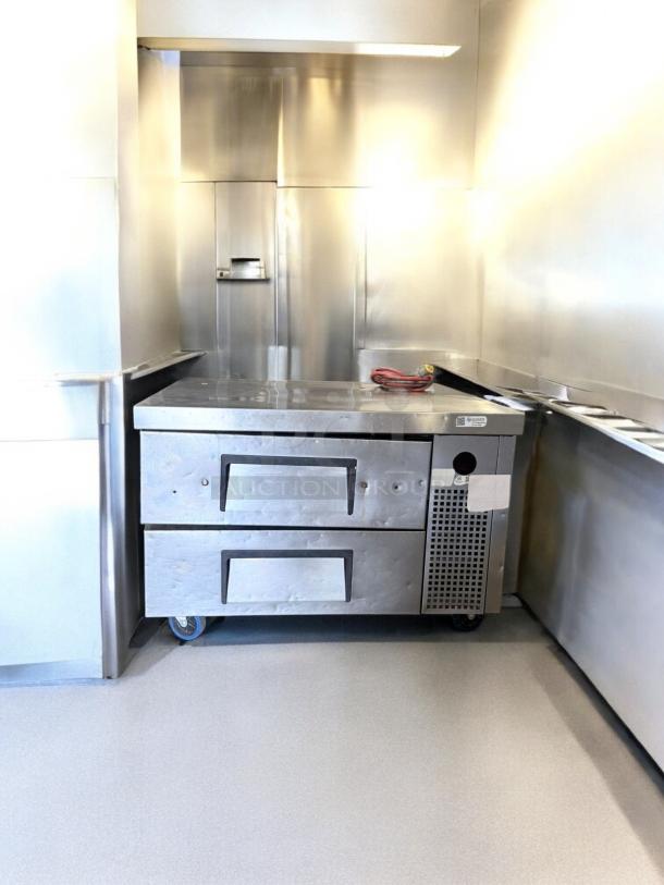 Randell 2-Drawer Refrigerated Chef Base in excellent condition, stainless steel, 115V, fully tested, featuring sturdy handles.