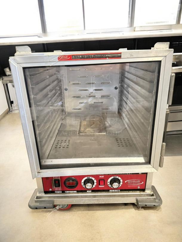 Winholt NHPL-1836 mobile heated proofing cabinet in excellent condition, 120V, fully tested, with control dials and clear door.