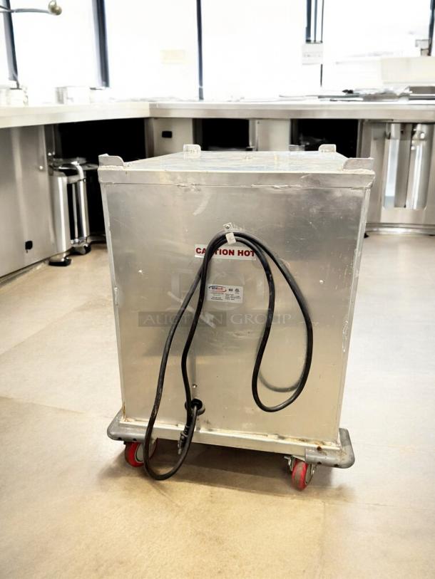 Winholt NHPL-1836 mobile heated proofing cabinet, excellent condition, 120V, fully tested, visible caution label, on wheels.