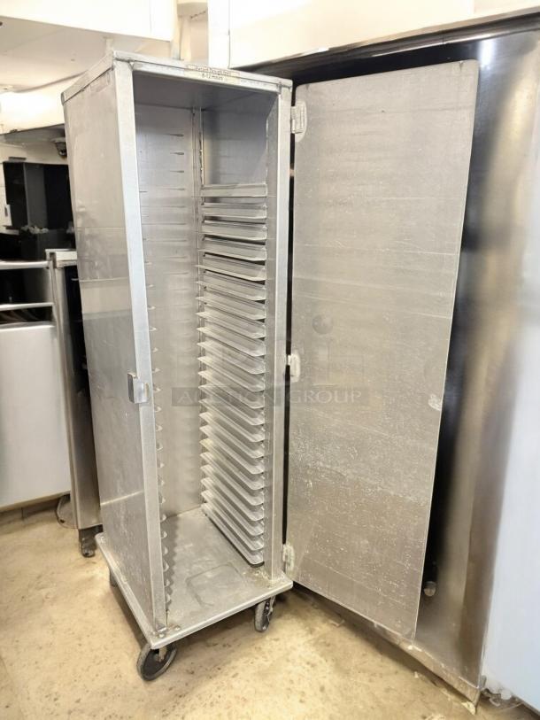 Lockwood CA60-RR25-C full height enclosed pan rack, excellent condition, NSF certified, industrial wheels, fully tested.