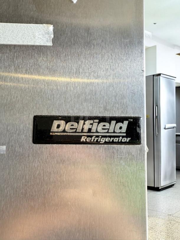 Delfield VRR2-S two-door commercial refrigerator, excellent condition, 115V, stainless steel, visible Delfield logo.
