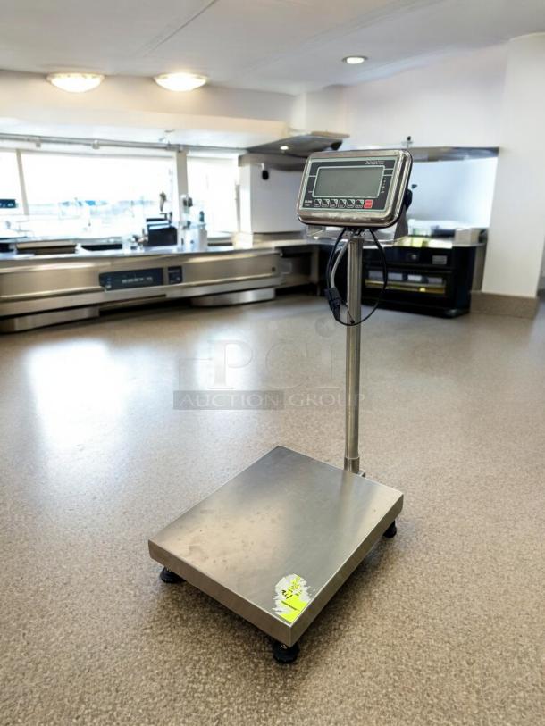 Uline Digital Platform Scale, Model H-5837, 120V, excellent condition, stainless steel base, fully tested and working.
