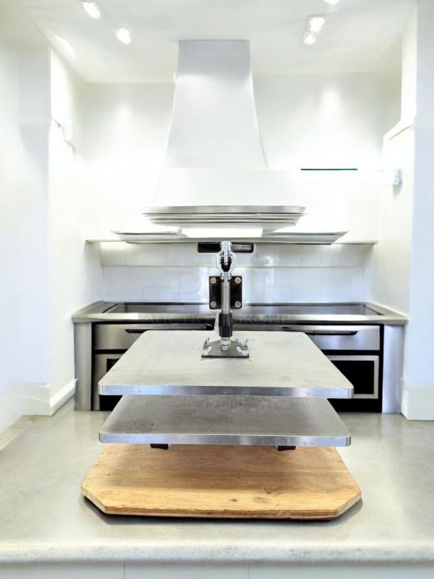 DoughXpress Pizza Dough Press, manual model in excellent condition, fully tested and working, metal plates visible.