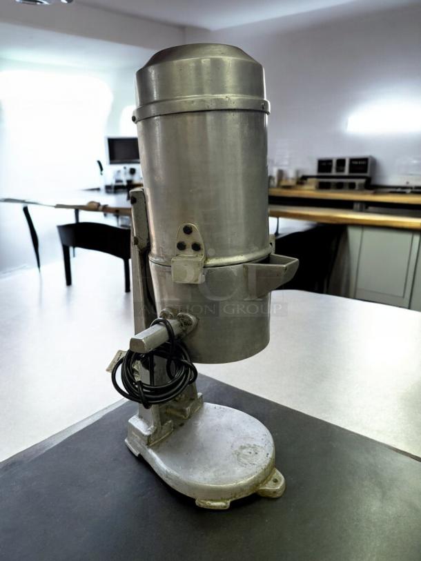 Commercial heavy-duty vegetable cutter, industrial model, in excellent condition. Fully tested, metal build, power cord attached.