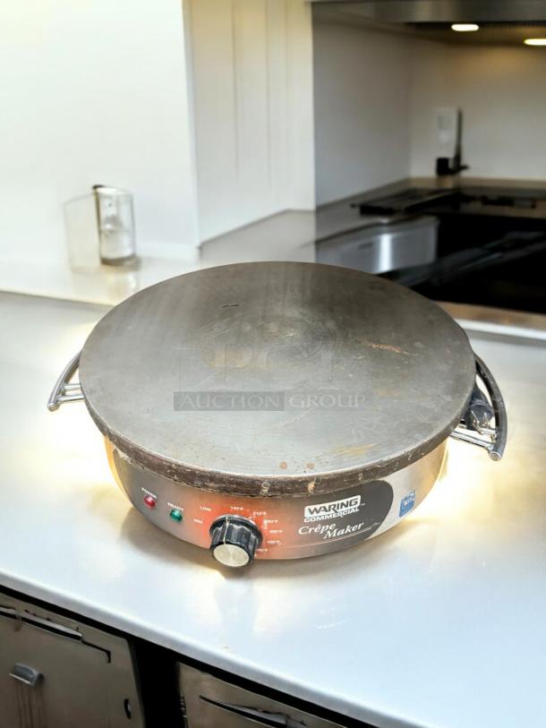 Waring Commercial Crepe Maker WSC160, excellent condition, 120V. Features temperature control and indicator lights.