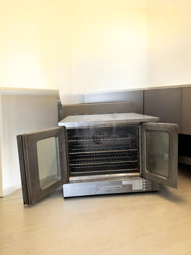 Southbend Marathoner Gold electric convection oven, model 208/240V, excellent condition, open doors, interior racks visible.