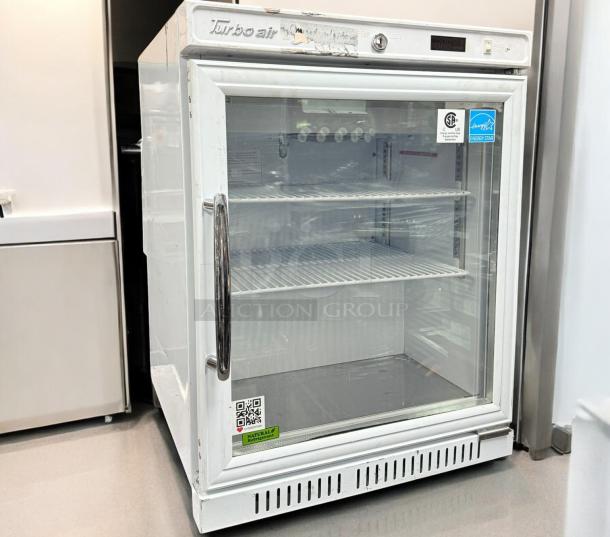 Turbo Air TSU-4RW-N6 undercounter refrigerator in excellent condition, Energy Star certified, with visible glass door and metal handle.
