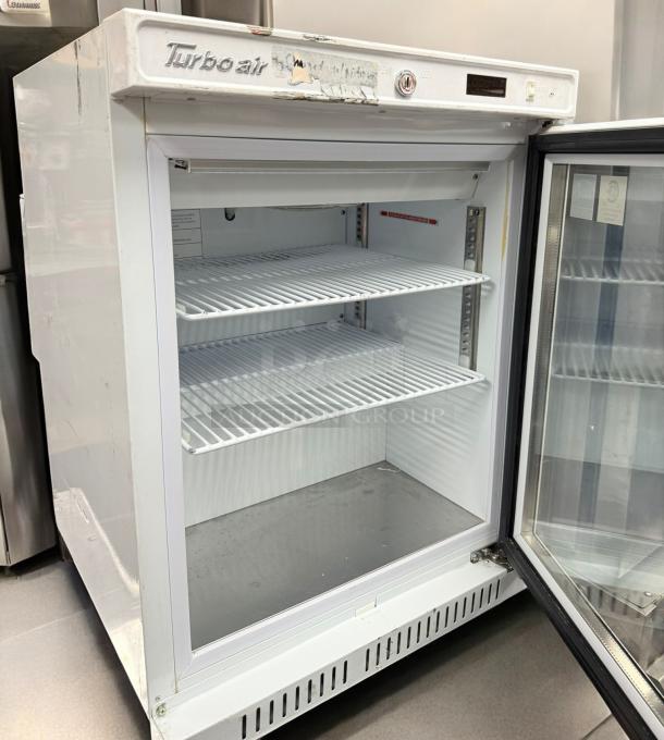 Turbo Air TSU-4RW-N6 Undercounter Refrigerator, excellent condition, open door view, three wire shelves, 120V.