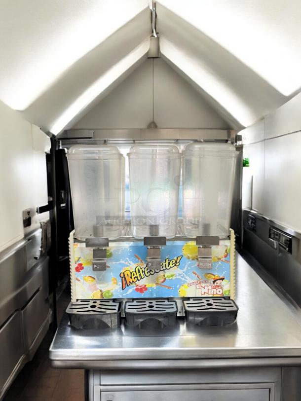 El Niño 3-Container Beverage Dispenser in excellent condition, fully tested and working, 120V, vibrant design.