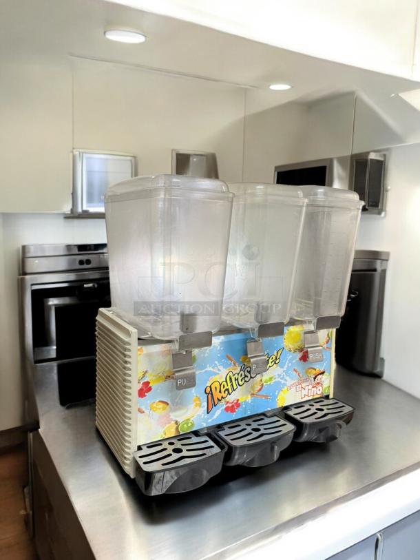 El Niño 3-Container Beverage Dispenser, excellent condition, 120V, fully tested, with colorful branding and push levers.