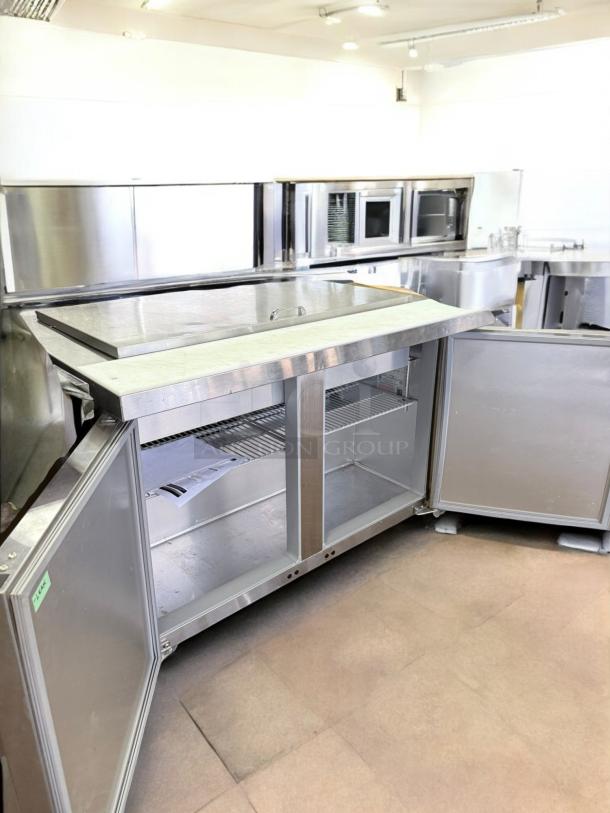Continental SW48BN18M 48" undercounter refrigerator in excellent condition, with open doors showing shelves, tested and working, 115V.