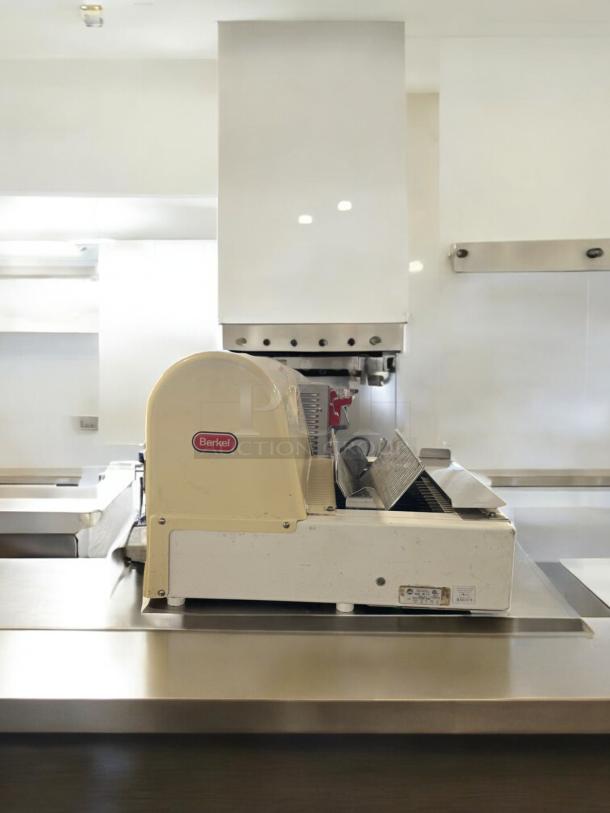 Berkel MB 1/2 bread slicer in excellent condition, 115V, fully tested and working. Berkel logo visible.