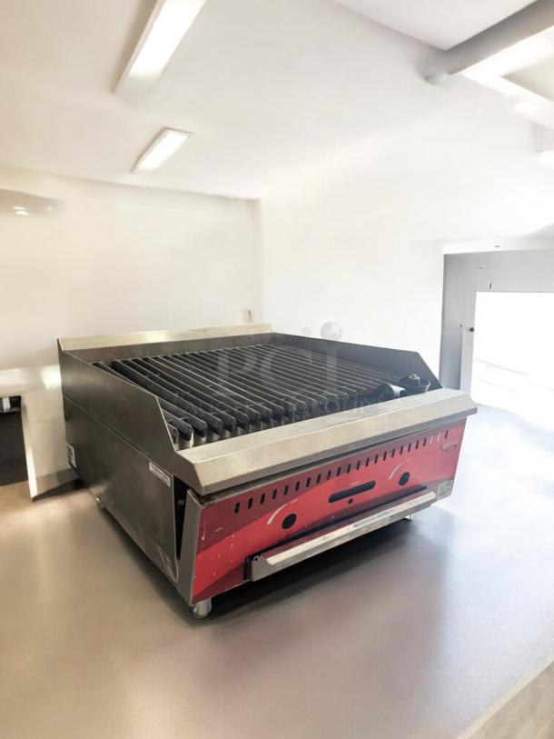 Avantco Chef Series Lava Rock Charbroiler, natural gas, excellent condition, fully tested, red front panel.