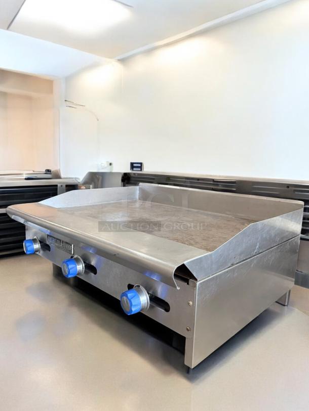 American Range 36" Heavy-Duty Gas Griddle, excellent condition, natural gas, tested and working, stainless steel exterior.