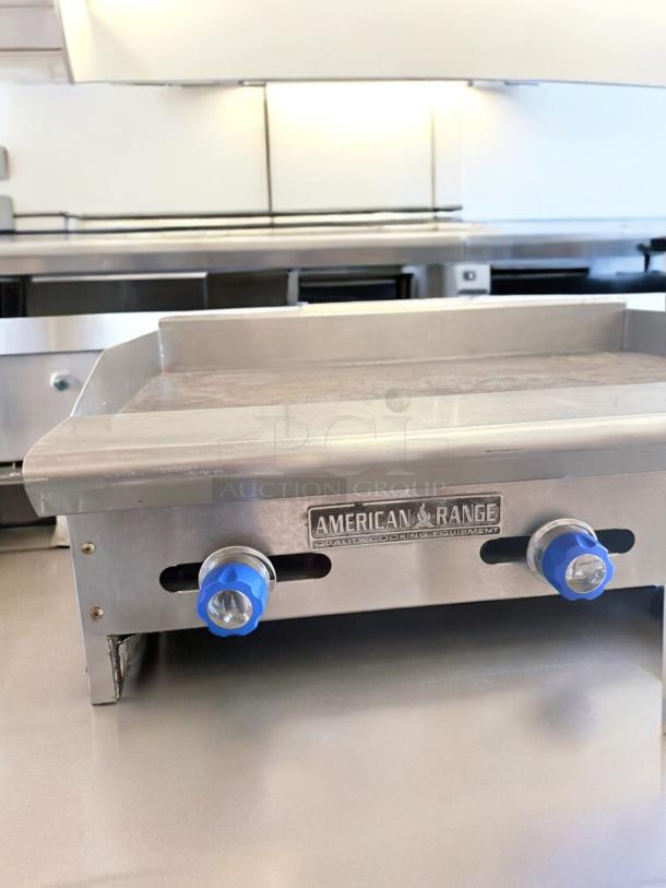American Range 36" Heavy-Duty Gas Griddle in excellent condition. Stainless steel, natural gas, dual control knobs. Fully tested.