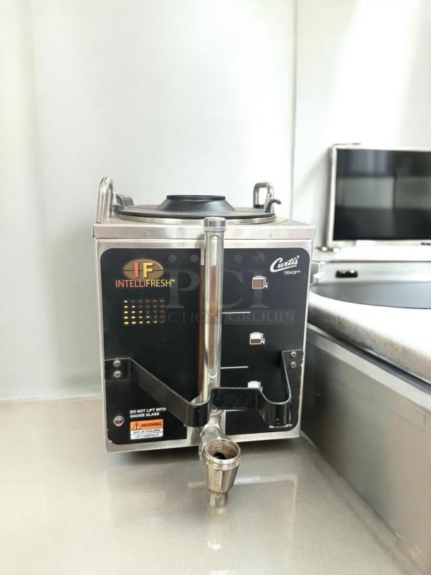 Curtis GEM-3IF IntelliFresh commercial coffee brewer in excellent condition, 120V, stainless steel, fully tested and working.