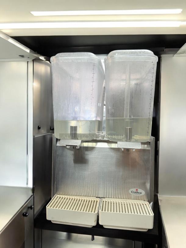 Crathco D25-3 Classic Bubbler beverage dispenser, excellent condition, 115V, dual clear containers, Crathco logo visible.