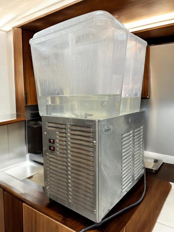 Crathco D25-3 Classic Bubbler Refrigerated Beverage Dispenser in excellent condition, stainless steel with dual tanks, 115V.