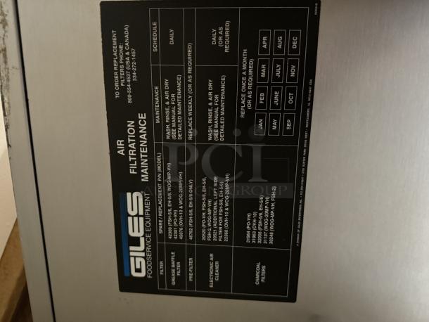 Giles hood system in excellent condition, like new. Includes a detailed air filtration maintenance schedule label.