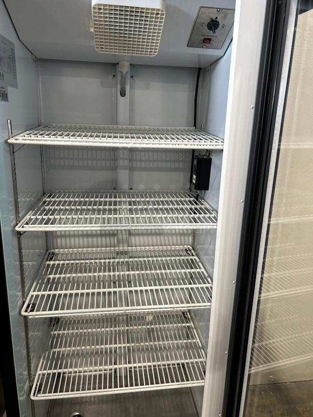 Avantco GDC-15-HC merchandiser refrigerator with glass door, LED lighting, five shelves; fully tested, excellent condition.