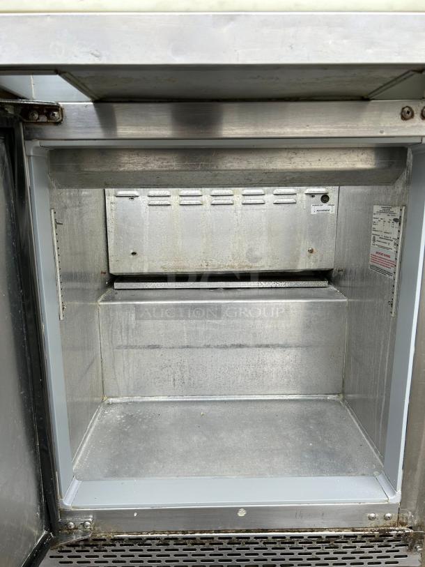 Continental SW27-12M Mighty Top Sandwich Prep Unit, 27", 7.4 cu ft, stainless steel interior, tested working condition.