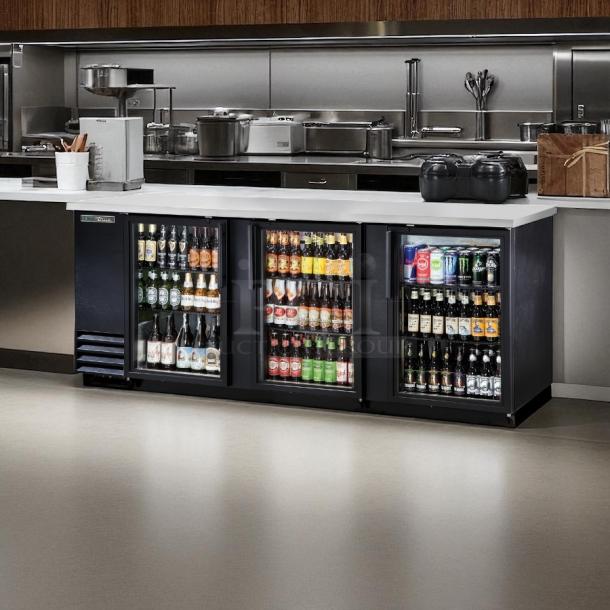 True TBB-4G back bar refrigerator, 90 3/8" wide, black with glass doors, LED lighting, fully tested, excellent condition.