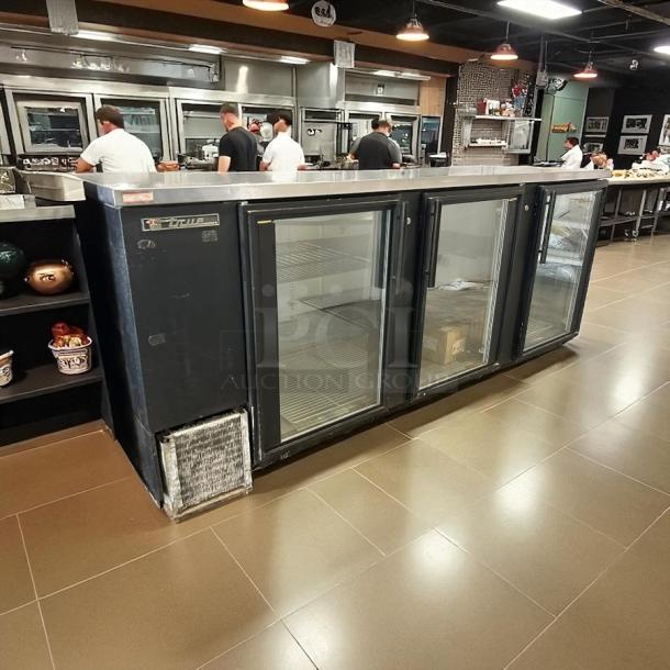 True TBB-4G-HC-LD 90" black glass door back bar refrigerator with LED lighting, excellent condition, fully tested.