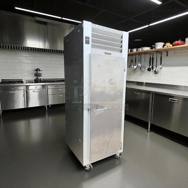 Traulsen G10010 30" solid door reach-in refrigerator, right hinged, excellent condition, tested, stainless steel, on casters.