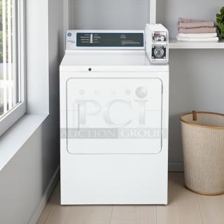 GE DCCD330EDWC 7.0 Cu. Ft. coin-operated electric dryer, excellent condition, tested and working, white exterior.