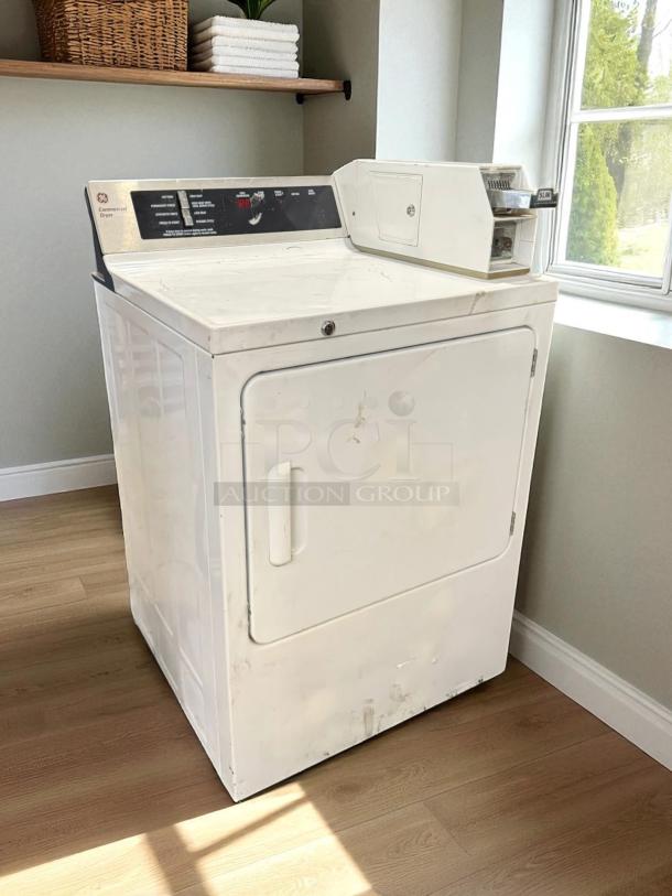 GE® Model DCCD330EDWC 7.0 Cu. Ft. Coin-Operated Electric Dryer, excellent condition, tested and working.