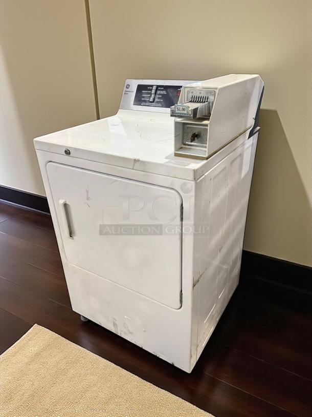 GE® DCCD330EDWC 7.0 Cu. Ft. Coin-Operated Electric Dryer, excellent condition, tested, working, visible coin slot, white.