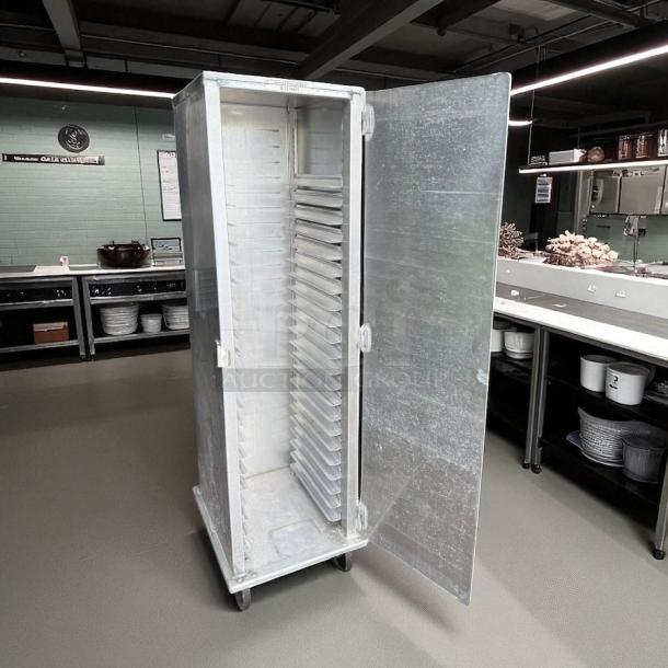 Lockwood CA60-RR25-C enclosed bakery rack, 1/2 size, excellent condition, tested, metal construction, open door view.