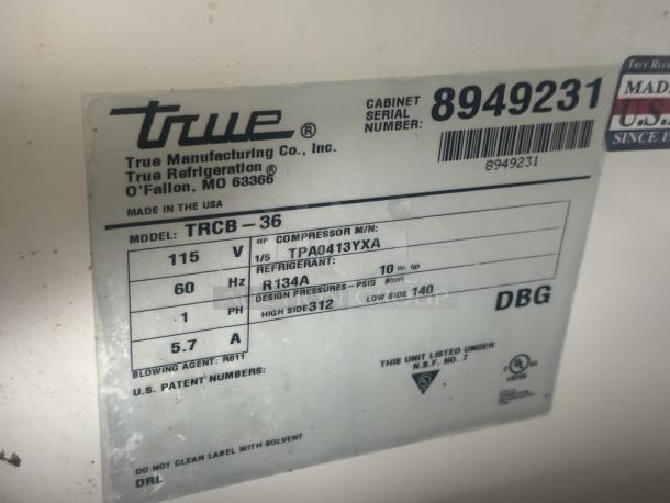 True TRCB-36-HC Chef Base Cooler label showing model, voltage, refrigerant type, and certification details. Made in USA.