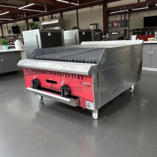 Avantco CAG-24-RC 24” gas charbroiler, like new condition, red panel, tested and working, ideal for commercial use.
