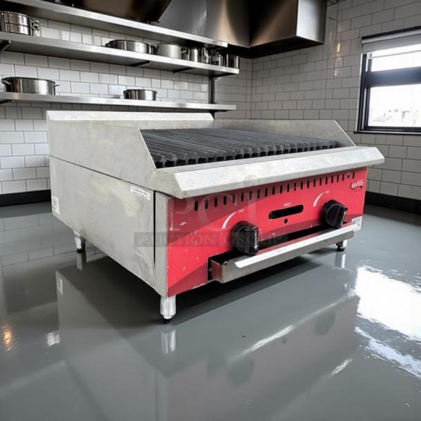 Avantco Model 177 CAG24RC 24” gas charbroiler, like new condition, dual knobs, tested and working, stainless steel finish.