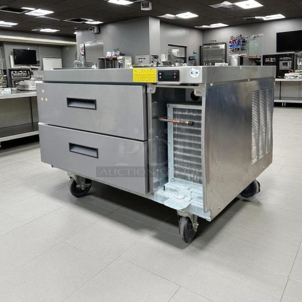 Delfield 36” Chef Base Model 1709150000704, with two drawers, tested and working, on wheels, in stainless steel.