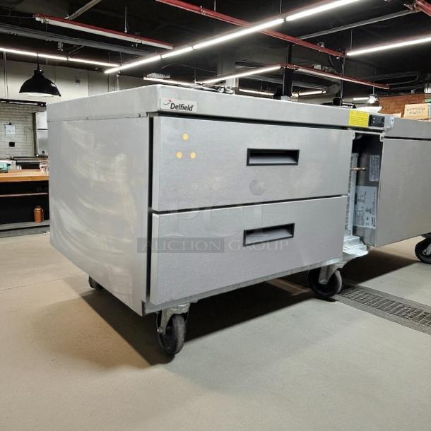 Delfield 36" Chef Base Model 1709150000704 in excellent condition, stainless steel, on casters, tested and working.