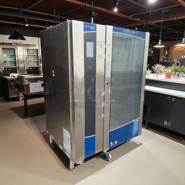 Electrolux AOS202GTP1 natural-gas combi oven, stainless steel, touch screen, tested, excellent condition, commercial kitchen use.