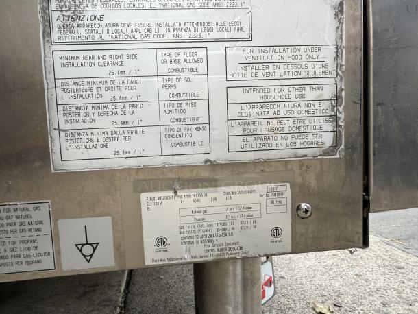 Electrolux Air‑o‑Steam AOS202GTP1 combi oven, natural gas, touch screen, tested and working. Labels indicate installation and gas details.