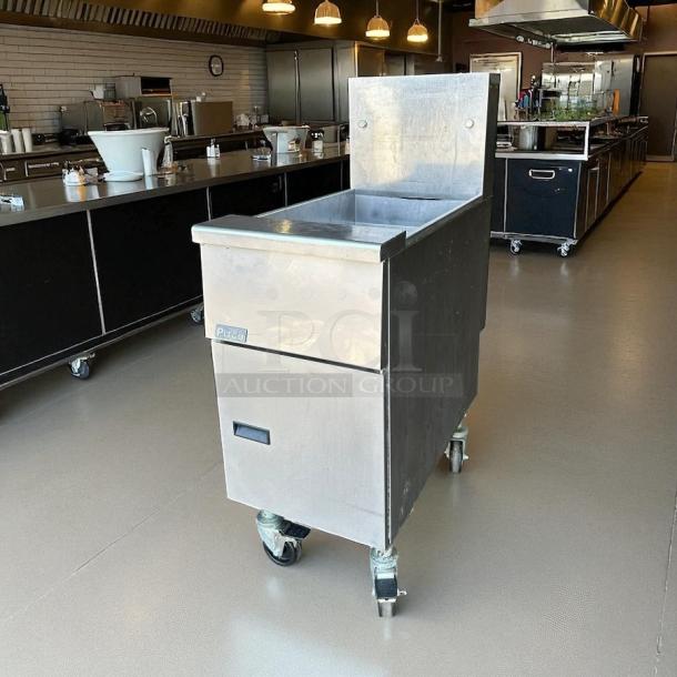 Pitco VF-35S gas fryer, 35 lb vat, floor model, natural gas, great condition, fully tested, on casters for mobility.