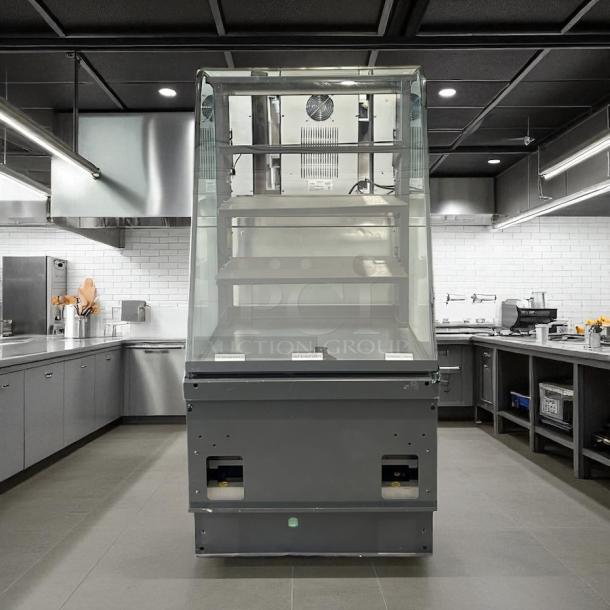 Structural Concepts dry display case in excellent condition. Tested and working, features multi-tier shelves, sleek glass front.