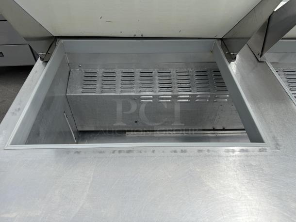 Continental SW60N24M 60" sandwich prep table, like new condition, stainless steel finish, refrigerated base, 115v, tested.