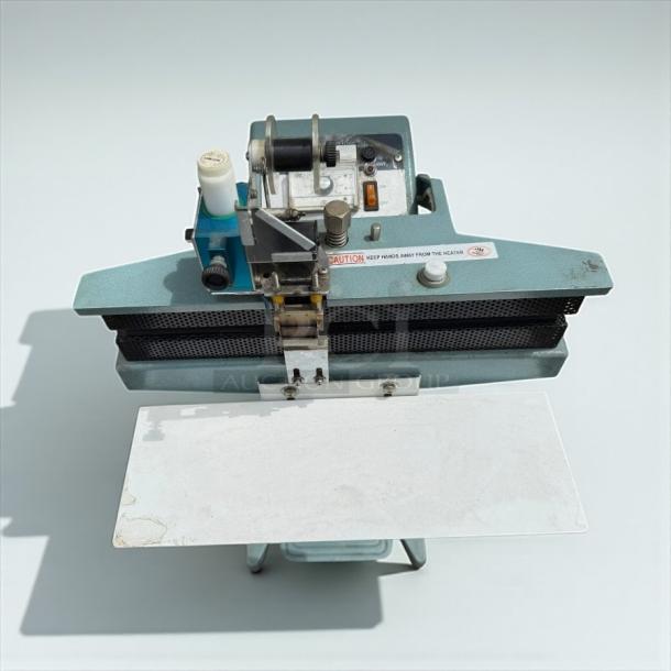 ULINE H-89 foot-operated impulse sealer, 18-inch, fully tested, excellent condition. Visible caution label.