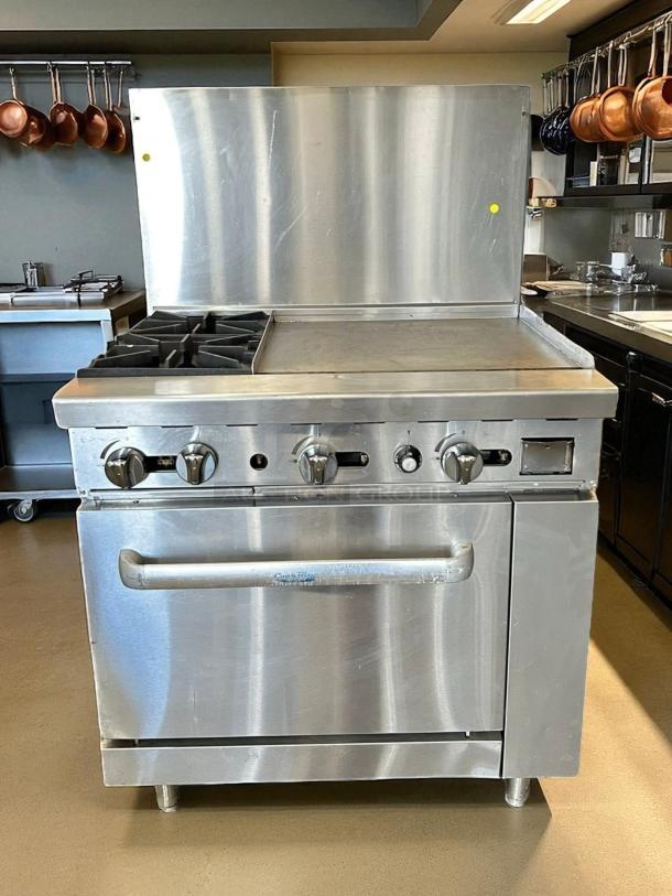 Atosa AGR-2B24GR 36" gas range with 2 burners, oven, and 24" griddle. Stainless steel, tested and working.