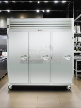 Traulsen RLT332WUT-FHS stainless steel three-section solid door reach-in freezer, 79 Cu. Ft., tested and working.