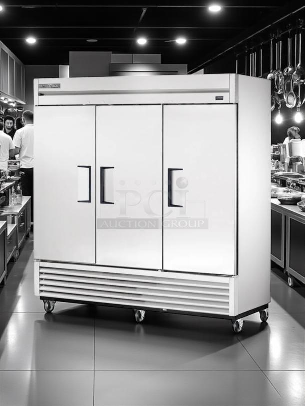 Three-door True T-72F-HC commercial freezer in excellent condition, 115V, fully tested and working, on casters.