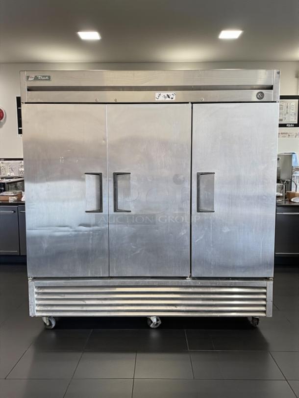 Excellent condition True T-72F-HC 3-door commercial freezer, stainless steel finish, 115V, on casters, fully tested and working.