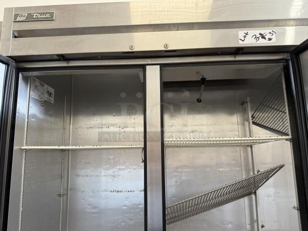 True T-72F-HC 3-door commercial freezer in excellent condition, 115V, fully tested, with shelving. Model and spec labels visible.